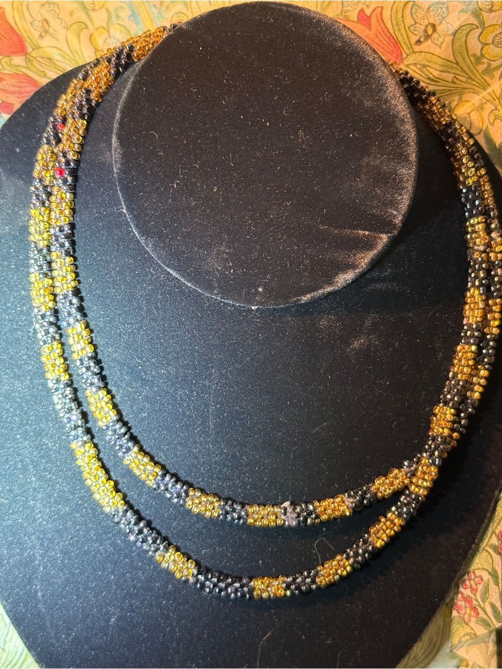 Vintage handmade necklace - woven w itch seed beads
no clasp 35” black gold